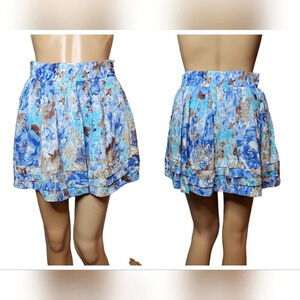 Leah Alexander blue floral mini skirt. Tulle lined.  Size small.